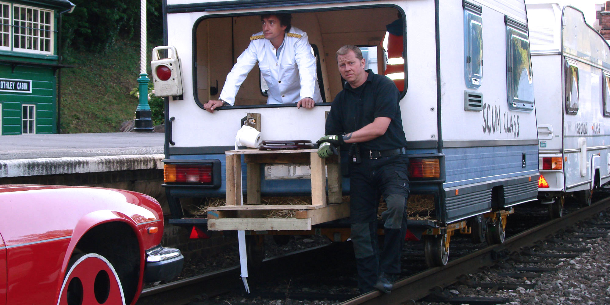 Do you want a vehicle engineered to be adapted to travel on a railway track and tow caravans?